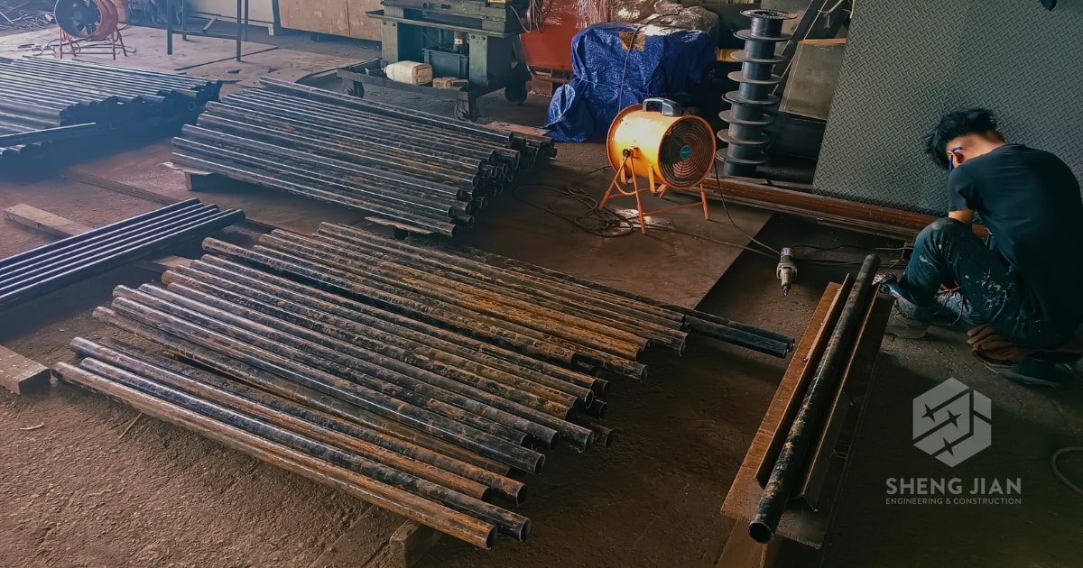 Carbon steel rods on a construction site.